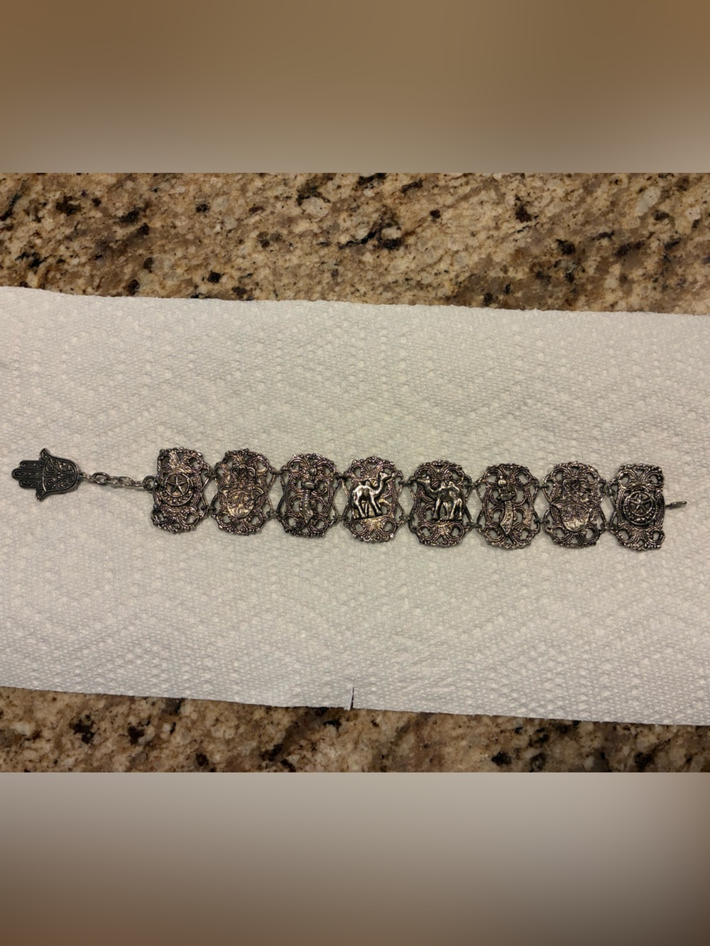 Intricate Silver-Tone Filigree Charm Bracelet with Hamsa Accent